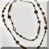 J162. Metal and stone long beaded necklace. - $38 